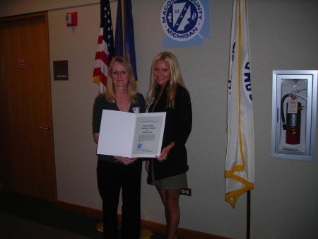 We love volunteers - Carey honors her constituent with an award for all her hard work at Wyandot Middle School.