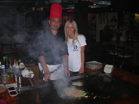 Osaka Restaurant - Carey helps Rolando cook on a hibachi grilll at the Osaka Restaurant