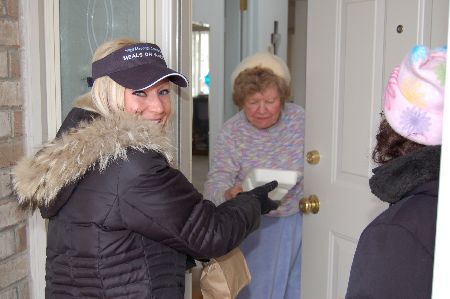 Meals On Wheels - Carey volunteers for the Meals On Wheels program and helps deliver food to those who need it.