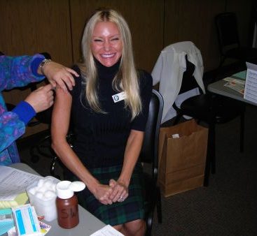 Carey gets a Flu Shot! - Carey gets a flu shot at the senior outreach program she sponsored. This program offered free flu shots to senior citizens. Carey says