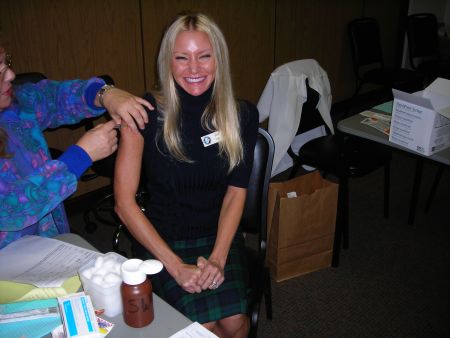 Carey gets a Flu Shot! - Carey gets a flu shot at the senior outreach program she sponsored. This program offered free flu shots to senior citizens. Carey says
