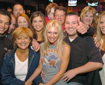 Carey's Supporters - Carey takes a moment to celebrate her victory at Cheli's Chili Bar in her district
