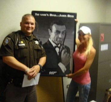 Deputy Rescues Bond!!! - Deputy Burbeula from the Macomb County Sheriff's Office was called upon to find a missing James Bond 007 poster at the County Building. He found it and returned it to it's rightful owner. Great detective work! Thanks Deputy...you saved the day. Carey Torrice FULLY SUPPORTS all deputies and corrections officers at the sheriff's office. Sheriff Mark Hackel really knows how to pick 'em!
