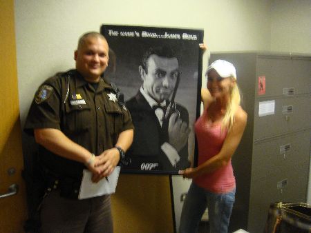 Deputy Rescues Bond!!! - Deputy Burbeula from the Macomb County Sheriff's Office was called upon to find a missing James Bond 007 poster at the County Building. He found it and returned it to it's rightful owner. Great detective work! Thanks Deputy...you saved the day. Carey Torrice FULLY SUPPORTS all deputies and corrections officers at the sheriff's office. Sheriff Mark Hackel really knows how to pick 'em!