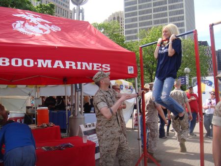 In memory of her USMC Father - Torrice is built Marine tough!  Carey does a chin-up for over 50 seconds and out lasts all the competition.