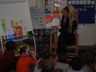 Carey reading to Children - Macomb County Commissioner Carey Torrice reading to children at MISD