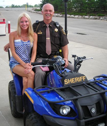 Carey and Lt. Donovan - Macomb County Commissioner Carey Torrice checking out the Sheriff's ATV at Freedom Hill